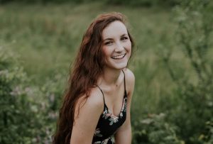 Young woman outside happy close up